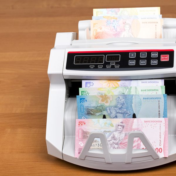 Indonesian money - Rupiah in a counting machine